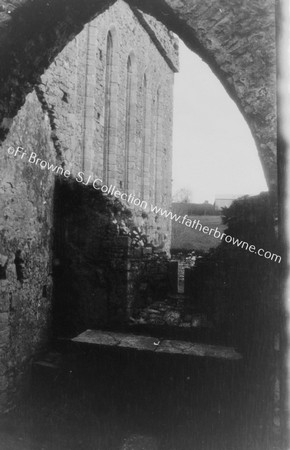 ATHASSEL PRIORY  CHANCEL  N. CHAPEL OF S. TRANCEPT WITH S. WALL OF CHANCEL THROUGH ARCH